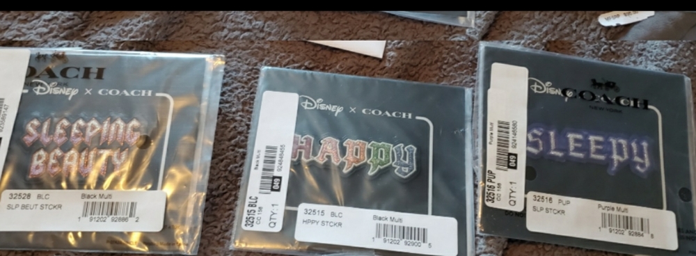 3 piece package of Coach x Disney stickers
